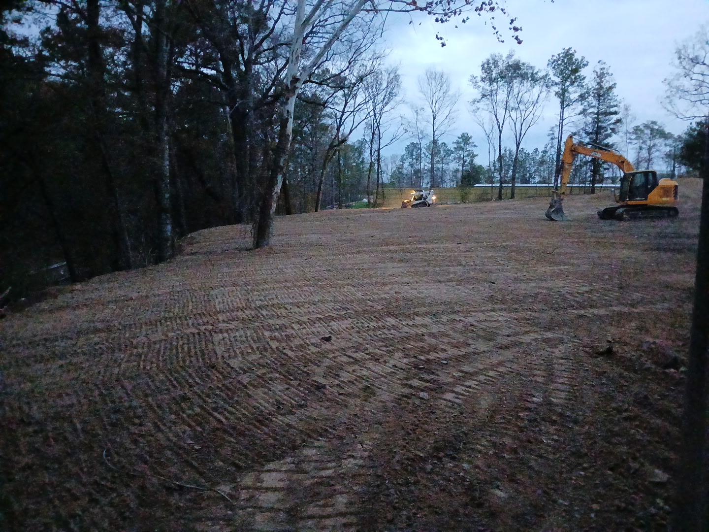 Cleared and graded land pad after Archon Land Management site prep